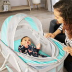 Dream On Me Karley Bassinet in Blue and Grey, Quick Fold and Easy to Carry, Large Storage Basket