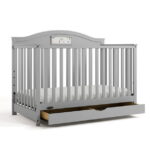 Graco Story 5-in-1 Convertible Baby Crib with Drawer and Reversible Headboard, Pebble Gray